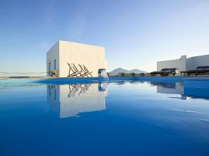 The swimming pool at or close to Lithos Luxury Rooms (Adults Only)