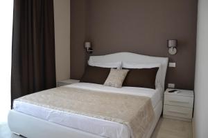 Postel nebo postele na pokoji v ubytování B&B Terra d'Oriente + 29 fotografií