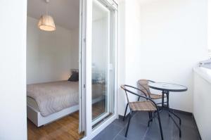 Postel nebo postele na pokoji v ubytování Jelena Apartment