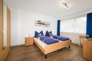 Postel nebo postele na pokoji v ubytování Haus Sonnmatt
