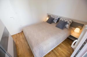 Postel nebo postele na pokoji v ubytování Jelena Apartment