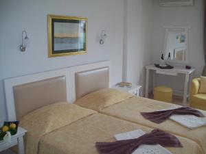 Postel nebo postele na pokoji v ubytování Hotel Vanilla