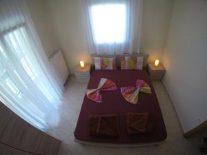 Posteľ alebo postele v izbe v ubytovaní Dimi Apartments