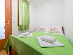 Posteľ alebo postele v izbe v ubytovaní Feel Good Apartment