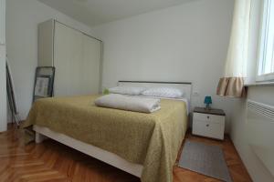 Posteľ alebo postele v izbe v ubytovaní Rijeka With Love Apartment