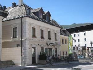 a building on the corner of a street at Apartment Gaspercic in Bovec