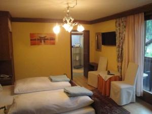 Postel nebo postele na pokoji v ubytování Pension & Appartement Steinwender