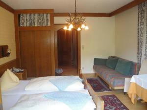 Postel nebo postele na pokoji v ubytování Pension & Appartement Steinwender