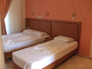 Ένα ή περισσότερα κρεβάτια σε δωμάτιο στο Villa Mary 2