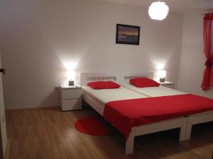 Postel nebo postele na pokoji v ubytování Illy City Centre Apartment