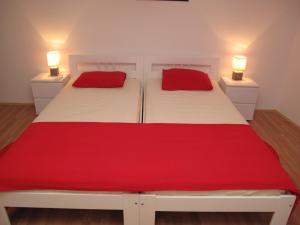 Postel nebo postele na pokoji v ubytování Illy City Centre Apartment