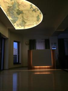 a room with a ceiling with a map on it at Royal Paradise Beach in Mamaia Nord