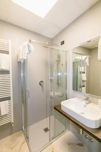 Vonios kambarys apgyvendinimo įstaigoje Hotel Mon Repos