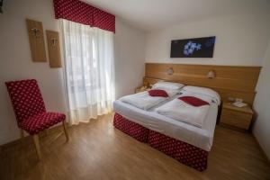 Posteľ alebo postele v izbe v ubytovaní Hotel Due Spade