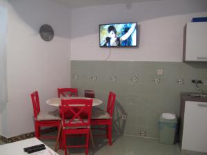 Kuchyň nebo kuchyňský kout v ubytování Illy City Centre Apartment