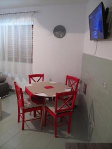 TV a/nebo společenská místnost v ubytování Illy City Centre Apartment