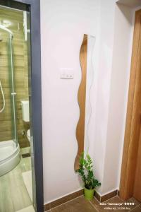 Koupelna v ubytování Apartment/Room ''Dalmacija'' SINJ