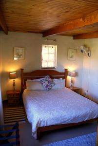 Postel nebo postele na pokoji v ubytování Tierhoek Cottages + 71 fotografií