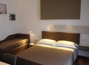 Posteľ alebo postele v izbe v ubytovaní I Cordari B&B