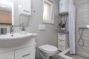 Kúpeľňa v ubytovaní Apartments Garmaz