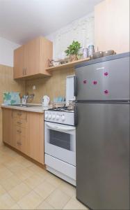 Kuchyňa alebo kuchynka v ubytovaní Apartments Garmaz