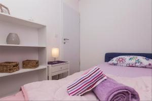 Posteľ alebo postele v izbe v ubytovaní Apartments Garmaz