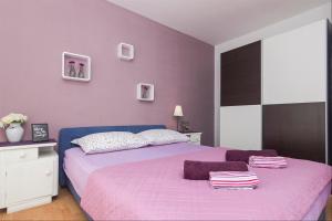Posteľ alebo postele v izbe v ubytovaní Apartments Garmaz