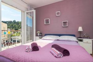 Posteľ alebo postele v izbe v ubytovaní Apartments Garmaz
