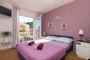Posteľ alebo postele v izbe v ubytovaní Apartments Garmaz