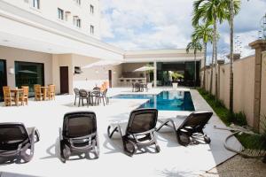 The swimming pool at or close to Class Hotel Pouso Alegre