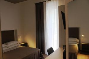 Posteľ alebo postele v izbe v ubytovaní I Cordari B&B