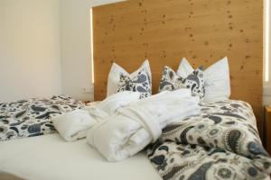 Letto o letti in una camera di Haus Kibitz