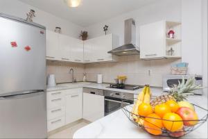 Kuchyňa alebo kuchynka v ubytovaní Apartments Garmaz