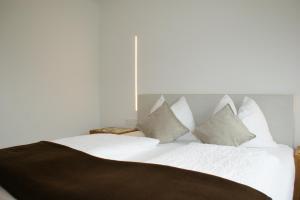 Letto o letti in una camera di Haus Kibitz