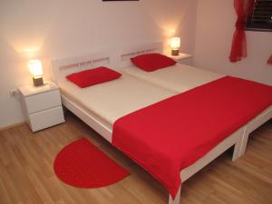 Postel nebo postele na pokoji v ubytování Illy City Centre Apartment