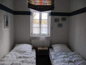 Postelja oz. postelje v sobi nastanitve "Alter Bahnhof" Schalkenmehren