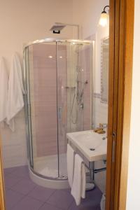 a bathroom with a shower and a sink at Affittacamere "Gilda INN Agerola" in Agerola +39 photos