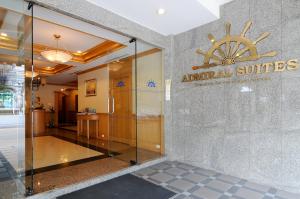 a entrance to an animal services building with a glass door at Admiral Suites Bangkok in Bangkok