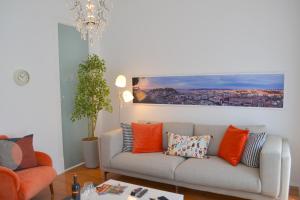 A seating area at TP MONTE 20, Lisbon Apartment