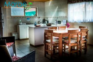 Dapur atau dapur kecil di Marae - Cabañas Premium