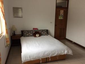 Una cama o camas en una habitación de Yuan Gong Yuan