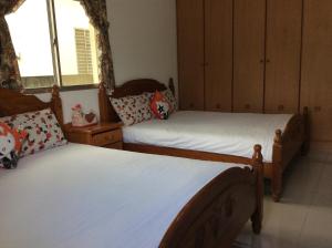 Una cama o camas en una habitación de Yuan Gong Yuan
