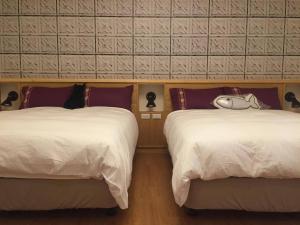 A bed or beds in a room at 爪窩 29 Nesuto