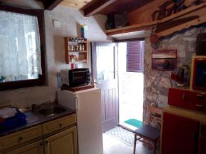 Kuchyň nebo kuchyňský kout v ubytování Apartman Nadia