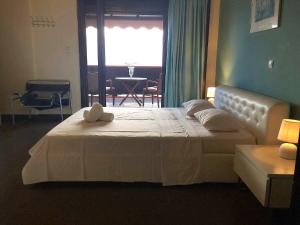Postel nebo postele na pokoji v ubytování Tajo Villas