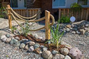 Ein Garten an der Unterkunft Strandfeeling