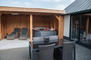 Posezení v ubytování B&B vakantieappartementen Dalerheugte