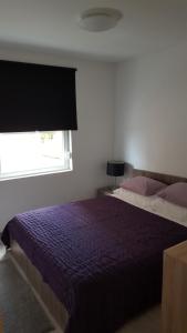 Posteľ alebo postele v izbe v ubytovaní apartmani mihaljević