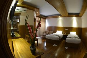 Katil atau katil-katil dalam bilik di Hotel Sidney