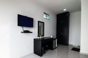 TV a/nebo společenská místnost v ubytování Langkawi Primrose Seaview